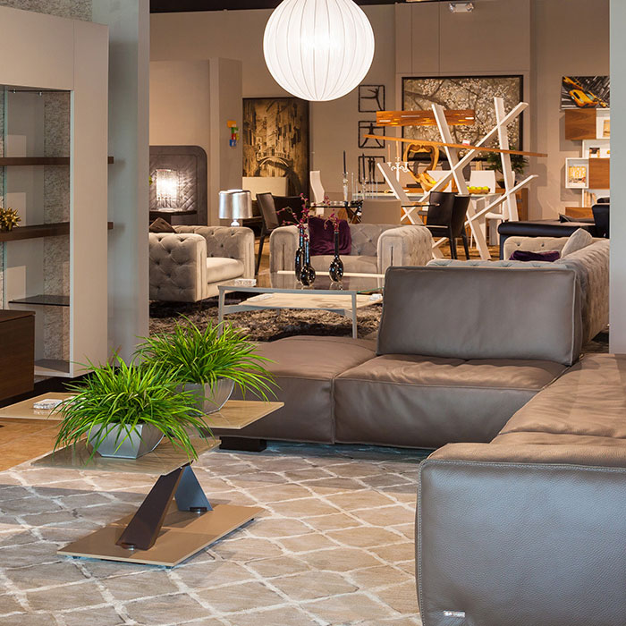 Soho sectional sofa and by Gamma Aredamenti and Atlante wall unit by Tomasella